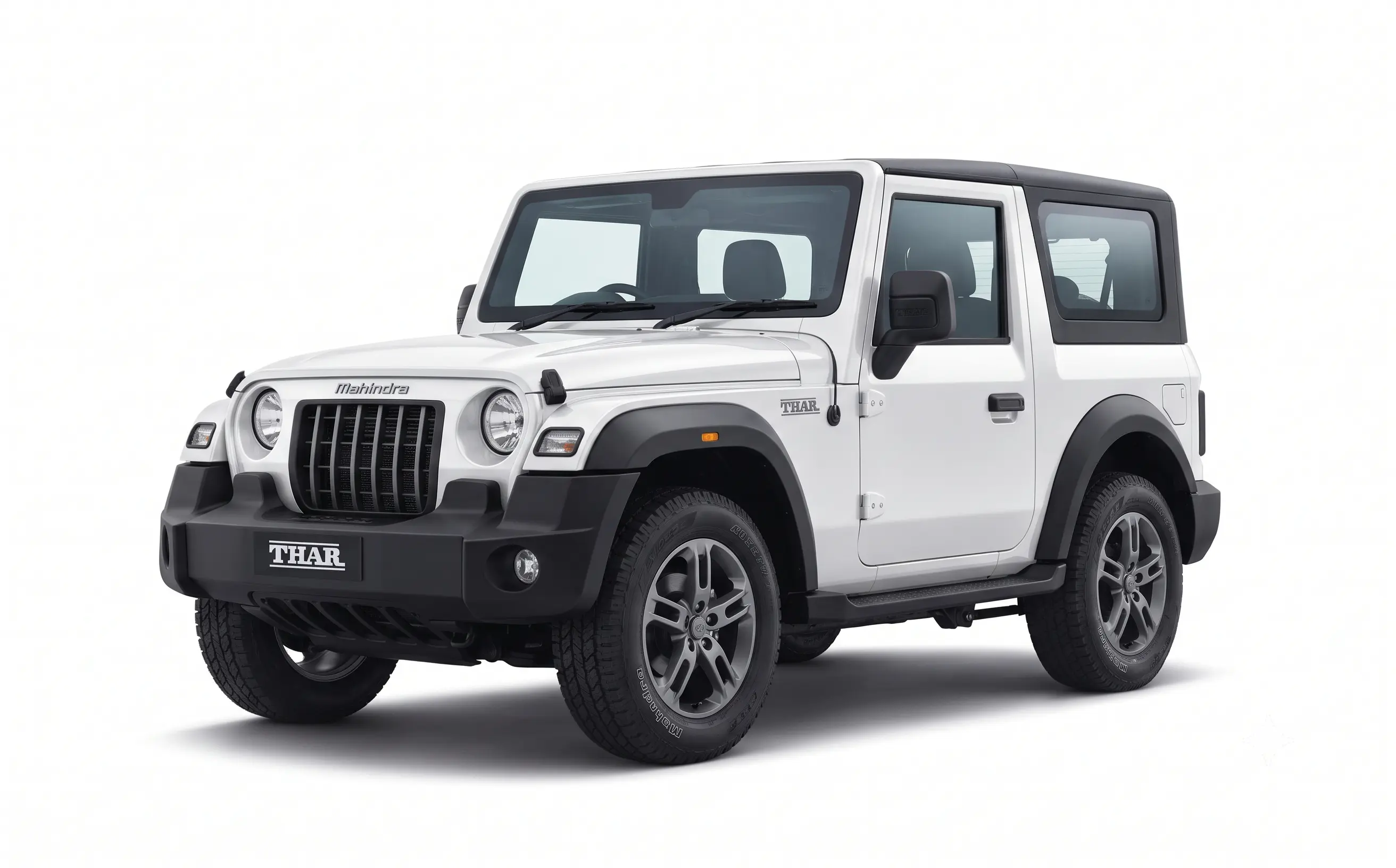 Mahindra Thar 4x4 SUV parked in mountain trail
